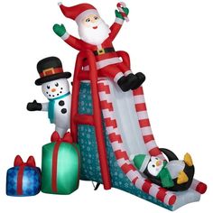 an inflatable christmas scene with santa and snowmen