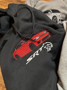 This Hoodie Is From Algo Melhor's Season 4 Drop. Prices Increase After the Drop Has Finished. For Next Seasons Drop Please Follow Our Instagram/Tik Tok @algomelhorapparel. Hell Cat Embroidered Hoodie CHOOSE YOUR COLOR CAR ON THE PERSONALIZATION SECTION ✅ALL ITEMS ARE MADE TO ORDER (shipping times can vary from 1 week to 3-4 weeks. I am one individual doing this, please understand.  🧵 All Items Are Custom Made By Me Unless Stated Otherwise.  📲 Please Feel Free to Message Me If You Have Any Ques Hoodie Design Embroidery, Red Hooded Sweatshirt With Embroidered Graphics, Red Hooded Hoodie With Embroidered Graphics, Red Embroidered Hooded Hoodie, Red Embroidered Graphic Hoodie, Car Hoodies, Car Sweatshirt, Car Hoodie, Hell Cat