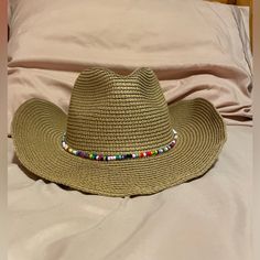 Never Worn, Only Fiddled With The Foldable Rim Adjustable Head Width On The Inside The Decor Can Be Removed But Came Attached Open To Questions Open To Reasonable Offers Beaded Fedora Sun Hat For Vacation, Casual Beaded Fedora Sun Hat, Summer Brown Beaded Hat, Adjustable Beaded Straw Hat For Spring, Summer Beaded Fedora Sun Hat, Spring Adjustable Beaded Straw Hat, Spring Beaded Adjustable Straw Hat, Casual Wide Brim Beaded Straw Hat, Casual Beaded Straw Hat For Spring