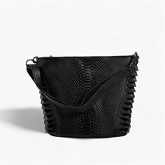 Elevate your everyday style with this classic black leather shoulder bag, designed for those who appreciate both functionality and elegance. This expertly handcrafted bag is made from high-quality genuine leather, showcasing a unique textured pattern and decorative leather straps on the sides that add a touch of sophistication. Key Features: Functional Interior: The bag features an inner zipped pocket, perfect for securing your valuables, and an open pocket designed for easy access to your cell Luxury Black Satchel Shoulder Bag, Luxury Black Bucket Shoulder Bag, Luxury Black Hobo Shoulder Bag, Luxury Black Satchel Bucket Bag, Luxury Black Rectangular Bucket Bag, Black Bags With Leather Lining For Evening, Large Capacity Leather Hobo Bag For Formal Occasions, Luxury Black Hobo Bag With Leather Lining, Black Evening Bag With Leather Lining