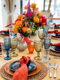 the table is set with place settings for four