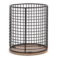 a black metal basket with wooden bottom