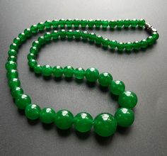 "Round jade stone beaded gemstone necklace material: dyed jade beads Size: 6mm-14mm, if order other size, please connect me length: photo is 19\" in length, length you may choose hand knot every bead. ❤ If you want other color or length, Please connect me free.this may match earring,bracelet, ❤Please read the store policy before purchase. ❤ Thank you for visiting my shop!" Jade Gemstone Beaded Necklaces With Round Beads, Jade Gemstone Beaded Necklace With Round Beads, Jade Beaded Necklaces With Faceted Beads, Jade Beaded Necklace With Faceted Beads, Jade Necklaces With Faceted Round Beads, Round Jade Necklace With Faceted Beads, Jade Gemstone Beads, Round Shape, Beaded Necklace Green, Pink Jade