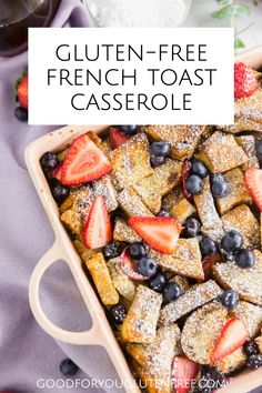 gluten - free french toast casserole with berries and powdered sugar