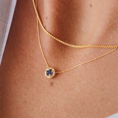 "Celebrate your birth month September as your favorite month of the year with this unique diamond sapphire necklace handcrafted in 14k solid gold. The halo of diamond stones encircles the elevated sapphire gemstone in a simplistic way. ‣ 2 Years Warranty ‣ Free Express International Shipping ‣ Free returns within 30 days from the order date Features * Made to Order. * Material: Solid Gold (real solid gold, no gold-filled or no gold plated material) * Gold KT: 14K * Choice of Gold Color: Yellow G Blue Sapphire Pendant, Blue Sapphire Necklace, Halo Necklace, Gold Diamond Necklace, Sapphire Pendant, Gold Halo, Buying Diamonds, Unique Diamonds, Sapphire Necklace