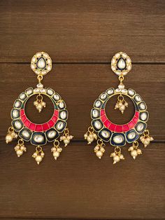 Meenakari Hand painted chandbali earring in red any navy blue color. Earring has beautiful kundan and pearl details to enhance its look with beautiful colors to get that Bollywood vibe.  All orders Ship same day if placed before 4:00 PM EST  Create beautiful memory for any occasion with elegant jewelry for your loved ones You will receive carefully packaged items in jewelry box, ready to give memorable gift  to your Wife, mother, sister  friend or collegue. All orders will be shipped  out in 1 Luxury Bollywood Meenakari Earrings, Luxury Meenakari Chandbalis, Chandbali Earrings With Mirror Work For Celebration, Multicolor Chandbali Earrings For Celebration, Meenakari Chandelier Earrings For Diwali, Festive Kundan Chandbalis In Anarkali Style, Multicolor Meenakari Chandbali Danglers, Multicolor Chandbali Chandelier Earrings, Multicolor Chandbali Kundan Chandelier Earrings