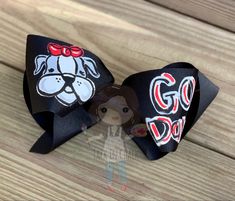 "3\" Wide Gross Grain Ribbon Bow size = 8\" Very Nice Large Hair bow for those girls! Black Ribbon Bulldog Painted in acrylic paint on left side Right side will say Go Dawgs *Have a personal request and want a name or initials versus having Go Dawgs please include in the personalization option and make sure Name is Correct and initials are in the order of firstLastmiddle *Hand Made Hairbows in the USA" Painted Hair Bows, Hand Painted Hair, Large Hair Bow, Go Dawgs, Large Hair Bows, Bow Ideas, Autumn Painting, Custom Hand Painted, Hair Painting