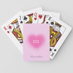 four pink playing cards with the number 666 on each one and an image of a woman's face