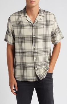 Make the most of your downtime in the relaxed comfort of this camp shirt cut for an easy fit from a cool, lightweight cotton blend. 28 1/2" length; 45" chest (size Medium) Front button closure Convertible collar Short sleeves 67% organic cotton, 33% lyocell Machine wash, line dry Imported Convertible Collar, Camp Shirt, Lace Shirt, Camping Shirt, Cut Shirts, Chest Size, All Saints, White Lace, Convertible