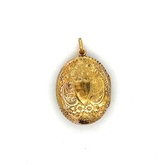 This locket beautifully embodies the elegance of the Victorian era. Crafted in 14 karat yellow gold, this oval shaped pendant features a black enamel front with seed pearl accents. The engraved edge is sophisticated while the intricate floral engraving on the back has a romantic feel. This necklace exudes a vintage charm and is perfect for any special occasion. Antique Medallion Locket Necklace Stamped 14k, Formal Yellow Gold Filigree Locket Necklace, Victorian Yellow Gold Oval Cabochon Jewelry, Victorian Yellow Gold Oval Jewelry, Victorian Oval Yellow Gold Jewelry, Ornate Gold Oval Cabochon Jewelry, Formal Yellow Gold Locket Necklace With Intricate Design, Ornate Yellow Gold Hallmarked Locket Necklace, Antique Gold Filigree Locket Necklace For Formal Occasions