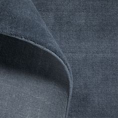 close up view of the back of a dark blue suit