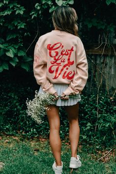 We are in our travel girl era. Take me to Paris! C'EST LA VIE!! The French saying "That's Life" is hittiing all the vibes! With the cutest little passport stamp details. This pink/peach sweatshirt with red puff print is fannnnnnntastic. Peach Sweatshirt, Take Me To Paris, Passport Stamps, Travel Girl, Puff Print, Top Graphic Tees, Boot Accessories, Hair Accessories Jewelry, Heels & Wedges