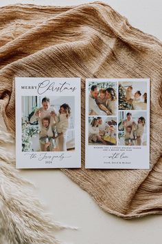 two christmas cards sitting on top of a blanket