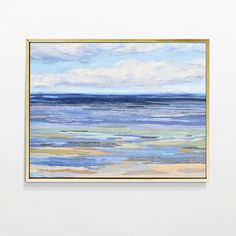 a painting hanging on the wall next to a white wall with a blue ocean in it