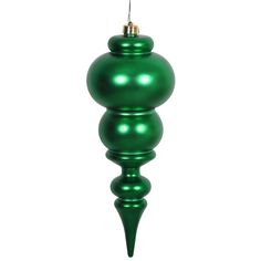 a green ornament hanging from a wire