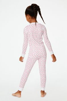 We're all looking forward to bedtime stories in these adorable Hearts Pajamas! With oh-so-comfy 100% premium cotton, this matching top and bottom set is perfect for slumber parties. And a match your mini moment?! Doesn't get sweeter than that! 3 Button Henley Elastic Waist Super-Smooth Flatlock Seams Runs Small; Please Size Up Materials and Care 100% Long-Staple Premium Cotton Machine wash warm with like colors. Do not bleach Line Dry recommended. Warm iron if needed Imported Prewashed Measureme Cozy Pink Loungewear Sets, Cozy Pink Sets For Pajama Party, Cute Cotton Sleepwear For Sleepover, Cozy Cotton Bedtime Sets, Playful Cotton Sleepwear For Pajama Party, Cozy Pink Sets For Sleepover, Playful Cotton Sleepwear For Bedtime, Cotton Sleepwear Matching Set For Sleepover, Playful Pink Lounge Set