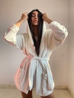 "Warm winter robe. A soft fluffy house robe is a great gift for her for the New Year. Mothers Day Warm dressing gown on a belt with a hood and pockets. Very comfortable warm and soft bathrobe. Home clothing is a unique type of product designed to give a feeling of comfort, coziness and warmth. The warm texture of the fabric will provide home comfort on autumn and winter evenings. Experience the highest quality of our products. Functions * Knitwear is very delicate, soft, warm, fluffy, durable. * Super Soft Comfortable Sleepwear For Home, Super Soft Cozy Sleepwear For Home, White Super Soft Comfortable Sleepwear, Super Soft Comfortable White Sleepwear, Comfortable Super Soft White Sleepwear, Cozy Hooded Robe For Loungewear, Cozy Robe With Relaxed Fit For Loungewear, Winter White Sleepwear For Relaxation, Cozy Long Sleeve Robe For Home