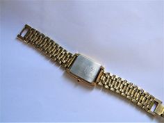 "For Sale: Retro Seiko Quartz Black Dial Wrist Watch Bracelet Band in Gold Tone PLEASE READ ENTIRE DESCRIPTION BEFORE PURCHASING Pre-owned item. Please see pictures for details. Sold as is, as seen on pictures, no returns. We do not alter/polish antique items (unless requested by buyer) and try to keep items as original as possible. The gold stone case and bracelet finish is coming off as shown in the pictures. Crystal and band also feature scratches as shown in pictures. Retro Seiko Quartz Wris Classic Formal Watch Bands, Stone Case, Watch Bracelet, Sterling Silver Chain Necklace, Gold Stone, Filigree Ring, Tube Beads, Silver Chain Necklace, Wristwatch Men