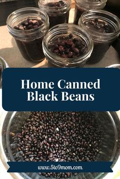 jars filled with black beans sitting on top of a table