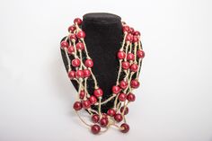 This is a knitted necklace made of wood. It can be a wonderful gift for the wife, grandmother, mother, sister, daughter, colleague. This is the perfect gift for any occasions, for example birthday, Mother's Day, New Year, or simply as a pleasant surprise. Size: Length of necklace - 60 cm. (23.6 inches) Diameter of beads - 1.5 cm. (0.3 inches) Thanks for shopping here! Best wishes, Aleksandr and Natalia Rustic Large Beads Jewelry As Gift, Rustic Large Beads For Gifts, Unique Handmade Natural Necklaces, Artisan Necklace With Large Beads, Artisan Necklace With Large Natural Beads, Unique Handmade Natural Color Necklaces, Red Fair Trade Necklace As Gift, Fair Trade Multi-strand Jewelry As Gift, Unique Natural Color Handcrafted Necklace