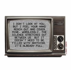 an old tv with the words i don't look at you, but i feel your hand reach out and cover me