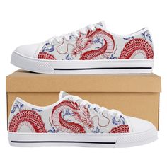 These Red Dragon Blue Ceramic White low top canvas shoes are ideal for being unique and standing out from the rest of the crowd. To be Gnarly, you need to be different and feel different. These shoes will help you express yourself through the intricate art and gnarly design it displays. This unique shoe is hand drawn/designed in the USA and built with fantastic quality. CONSTRUCTION: Our shoes are very well constructed with quality stitching and a solid base. They are comfortable and durable and suitable for most occasions. HANDCRAFTED DESIGN: Wearing these shoes is making a statement. Our shoes have bold and gnarly designs that fit anyone who want to separate themselves from the rest. The designs are inspired by art and beauty from around the world. Exclusively designed in the USA. __FEAT Casual Low-top Canvas Shoes With Red Sole, Converse Rouge, White Low Top Converse, Shoe Painting, Dragon Blue, Unique Shoe, Low Top Converse, Intricate Art, Style Converse