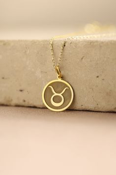 Gold Taurus Zodiac Pendant - Taurus Zodiac Gold Necklace ● Material of pendant: Solid Gold 14k ( REAL GOLD ) ● Metal Stamp: 14k ( REAL GOLD ) ● The pendant is available in 5 sizes: - 12,7 mm / 0.5 inches (Diameter) - 14,0 mm / 0,55 inches ( Diameter ) In the photos - 15,3 mm / 0.6 inches ( Diameter ) - 16,5 mm / 0,65 inches ( Diameter ) - 19,1 mm / 0,75 inches ( Diameter ) ( In the photos the size is 14mm / 0.55 inches Diameter ) ( Jump Ring inner diameter: 4 mm ) ● Material of chain: Solid gold Taurus Symbol, Gold Plated Zodiac Sign Necklaces For Gifts, Taurus Jewelry, Taurus Symbols, Gold Pendants For Men, Luxury Gold-plated Zodiac Sign Necklaces, Yellow Gold Zodiac Pendant Necklace, Yellow Gold Zodiac Sign Pendant Jewelry, Gold Plated Zodiac Sign Pendant Jewelry