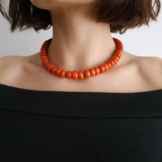 < Natural coral necklace > This product made according to the model of authentic traditional Ukrainian jewelry. The coral is modern, the design is vintage. Like 99% of the coral on the market these days, this coral has been dyed. I use bamboo coral which is not endangered or threatened in any way, unlike natural pink or red coral (the production of which is forbidden almost everywhere in the world). Bamboo coral doesn't mean it's not organic. Every bead of it has a distinctive and beautifu Spiritual Orange Beaded Necklace, Orange Red Coral Beads For Jewelry Making, Red Coral Necklace With Large Beads, Orange Red Coral Beaded Necklaces With Large Beads, Orange Red Coral Beaded Necklace With Large Beads, Orange Beaded Necklace With Large Red Coral Beads, Orange Polished Beads Necklace, Orange Red Coral Necklace With Round Beads, Spiritual Orange Necklace Made Of Red Coral