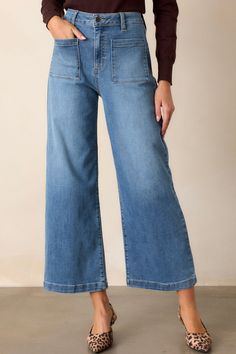 Rock out in style with our Sunday Morning Medium Wash Wide Leg Jeans! These jeans not only have a trendy wide leg design, but also offer a flattering medium wash that adds a touch of vintage vibe to any outfit. Perfect for music festivals, concerts, or just casual days, these jeans will have you feeling like a stylish angel! These medium wash jeans feature functional belt loops, a button zipper closure, functional front and back pockets and a wide leg. 
77% Cotton, 12% Polyester, 9% Rayon and 2% Spandex
Unlined 
Hand Wash Cold 
Manufactured in Vietnam 
Designed in The USA
Model is wearing a size 25 Preppy Girls, Corporate Chic, Going Out Looks, Rush Dresses, Long Crop Top, Concert Looks, Cardigan Crop, Dress Bra, Medium Wash Jeans