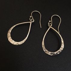 Simple, Lightly Hammered Design Dangle Earrings Sterling Silver With 9.25 / 925 Stamp Sterling Silver Fishhook Wires Tear Drop / Droplet Shape Approximately 1.2” Long Droplet, 1.65” Full Length ... And 7/10” Inch (2-Ish Mm) At Widest Point, Roughly 1-1.5mm Depth My Dad Got Me These In New Mexico, Artisan Made, Fancy, I Think Indigenous / Native American Made I’ve Never Worn Them Except To Take These Pictures, Hence Selling 925 Ss Lightly Hammered Earrings Remember I Make $76 On A $95 Sale Classic Hammered Drop Earrings, Classic Hammered Earrings For Anniversary, Hammered Sterling Silver Earrings For Anniversary, Modern Teardrop Sterling Silver Earrings, Elegant Hammered Dangle Teardrop Earrings, Elegant Hammered Teardrop Dangle Earrings, Elegant Hammered Everyday Earrings, Nickel-free Drop Jewelry For Anniversary, Everyday Sterling Silver Pierced Jewelry