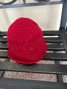 "The Bucket Hat is back. This is a handmade crochet hat that is designed fit snugly around your head and to protect your head and face from the sun's rays. The hat is made with a brim that can be worn turned up or down to suit your purpose. It is very stylish and reminiscent of the 70\"s. Color-Burgundy Size-Small to medium Length-   8 inches Diameter of the top (bowl of the hat) --6 inches Brim is 2 1/2 inches wide Body of the hat is 20 inches wide Machine wash and dry Acrylic" Red Crochet Hat For Beach, Red Adjustable Crochet Bucket Hat, Red One-size Crochet Hat For Beach, One-size Red Crochet Hat For Beach, One-size Red Crochet Hat For The Beach, Adjustable Crochet Beanie For Vacation, Red Crochet Hat With Adjustable Short Brim, Red Brimmed Crochet Hat For Beach, Red Crochet Wide Brim Hat