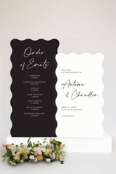 the wedding program is displayed next to flowers