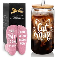 the cat mom is right next to her pink slippers and a canister filled with iced tea