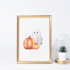 a watercolor painting of a ghost and pumpkin