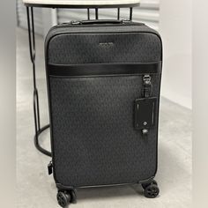 Please Read Brand New Item With Tags Please See It In Navy Also With Video Of Inside And Measurements! Item Is Brand New Never Used But Wheels Do Not Work Untouched - It Came To Me This Way From Outlet! Harrison 37u9lhrv4b Trolley Designer Black Rectangular Travel Bag, Designer Black Travel Bag, Black Luggage For Business Trips, Classic Black Luggage With Leather Trim, Designer Black Luggage With Sleeve, Luxury Black Cases With Luggage Sleeve, Classic Black Business Luggage, Designer Business Luggage In Rectangular Shape, Designer Rectangular Business Luggage