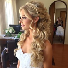 a woman with long blonde hair and a tiara on her head is standing in front of a mirror