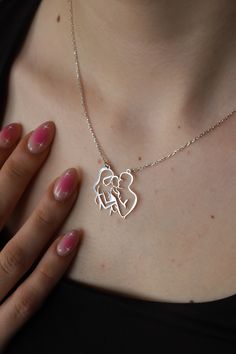 This cute 925 sterling silver necklace is a must for every woman. Can be worn alone, or layered with other necklaces for a trendier look. This silver animal necklace comes in a beautiful box, gift-ready!  ❤️ It would be an amazing gift for Anniversary, Birthdays, Christmas, Mother's Day, Women's Day. FEATURES - Material: High Quality Solid 925 Sterling Silver - Pendant height: 2.5 cm - Pendant width: 2.5 cm - Color Options: Silver, Yellow Gold, Rose Gold - Chain length 16 inches, 18 inches or 20 inches ❤️Production Techniques: Handmade and Laser Cutting (for High Quality) PACKING ❤️ All products are ready to be sent to you in stylish gift boxes. Also, there is no need for gift wrapping. SHIPPING AND RETURN - Production is made according to the order and delivered to the cargo next day. - S Line Art Family, Mom Dad And Baby, Family Silhouette, Silhouette Necklace, Baby Silhouette, Family Jewelry, Dad And Baby, Unique Silver Jewelry, Baby Necklace