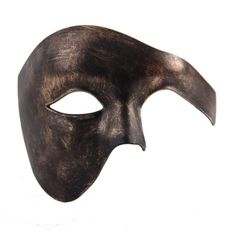 Our Phantom of the opera mask is inspired by one of the greatest shows of all time - The Phantom of the Opera, also known as Phantom. Our Phantom mask is the perfect choice for those making a phantom of the opera masquerade. Feel free to browse additional colors and styles including musical designs. We can supply these masks in bulk for your event. Halloween Theater Mask, Full Face Theater Masks For Halloween, Artistic Halloween Masks For Theater, Artistic Halloween Theater Masks, Artistic Masks For Theater And Halloween, Venetian Mask For Theater Halloween, Artistic Masks And Prosthetics For Theater Halloween, Phantom Masquerade Mask For Halloween, Phantom Color Masquerade Mask For Halloween