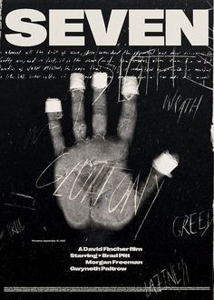 the poster for seven, which features hand prints and writing on black paper with white ink