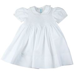 A beautiful smocked dress, unlike any other! This dainty little girls dress is a true classic with its embroidered smocked bodice, delicate fagoting, and fluted lace trim. Available in pink, white, and blue with a sweet peter pan collar and short puffed sleeves, edged with dainty fagoting and a fluted French lace trim. A classy smocked bodice features intricate hand made embroidery including a diamond overlay, soft white lines, and darling floral bullions. Ties in the back with a big classy bow Style White Dress, Smocking Baby, Feltman Brothers, Classic Baby Clothes, Dress With Lace Trim, Portrait Dress, Yoke Dress, Bolero Dress, Girls Easter Dresses