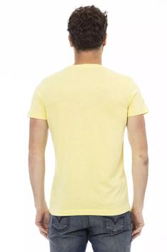 Elevate your style game with the Trussardi Action Short Sleeve T-Shirt, crafted to make a bold statement. With its striking front print, this tee is the perfect blend of comfort and high-fashion sensibility. The soft cotton-viscose blend offers a luxurious feel, while the vibrant yellow hue ensures you stand out in any crowd. Perfect for the fashion-forward individual ready to make a trendy impact. – Material: 90% Cotton, 10% Viscose – Country of origin: BD – Color: Yellow Haute Couture Brands, Sunshine Yellow, Tee Shirt Homme, Yellow Shorts, Cotton Viscose, Seychelles, Casual Tee, Primavera Estate, Casual Wardrobe