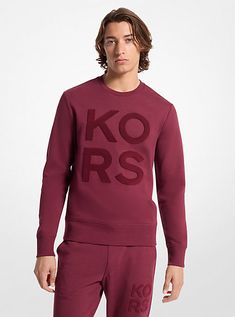 Cut from a cotton-blend knit and made to layer, this sweatshirt offers a signature statement for the weekend. “KORS” lettering in velvet adds tactile contrast, while the fit keeps it refined. Team it with the coordinating joggers for a sporty weekend look. Cotton Tops With Logo For Loungewear, Winter Athleisure Sweatshirt With Logo, Logo Cotton Tops For Loungewear, Fall Logo Sweatshirt In Athleisure Style, Sporty Sweatshirt With Logo And Relaxed Fit, Sporty Cotton Fleece Sweatshirt For Loungewear, Fall Loungewear Tops With Logo Detail, Crew Neck Top With Logo For Loungewear, Sporty Logo Sweatshirt For Loungewear