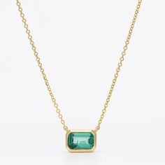 This gorgeous genuine emerald necklace is a must for anyone who appreciates the beauty and power of emeralds. It features a gorgeous authentic, natural emerald in a bezel set pendant design. A stunning gift for your beloved one or maybe even yourself! This beautiful necklace features a single genuine emerald 0,60ct , surrounded by solid gold. ›› Item Details: › Made to Order › Gold Kt: 14K (also available in 9K & 18K) › Available Gold Color: White Gold, Yellow Gold, Rose Gold › Gem Stone: Emeral Luxury Round Bezel-set Emerald Necklace, Bezel Set Emerald Necklace, Luxury Emerald Necklaces With Bezel Setting, Luxury Bezel Set May Birthstone Necklace, Classic Emerald Pendant Necklace, Classic Green Necklace With Rectangular Pendant, Gold Tsavorite Emerald Necklace For May Birthstone, Fine Jewelry Emerald Rectangular Pendant, Elegant Emerald Necklace With Rectangular Pendant May Birthstone