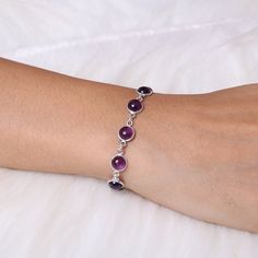 "Amethyst Bracelet / 925 Sterling Silver Bracelet / Handmade Bracelet / Adjustable Silver Jewelry / Gift For Her Gemstone Name - Amethyst  Stone Quality - AAA Bracelet Weight - 6.78 gm Stone Length - 0.6 cm , Stone Width - 0.6 cm Bracelet Length - 6 inch to 9 inch sizes are available, we give 0.5 inch adjustable in the size which you order ( NOTE - 0.5 INCH ADJUSTABLE IS INCLUDED IN YOUR ORDERED SIZE ) Stone Shape - As shown in the picture You'll get the exact product as shown in the pictures We serve complete 925 sterling silver Jewelry and genuine properties of the stone. The products are dispatched from the small business from USA. Product Quality and Packaging - Our all products are 925 Silver Stamped which shows that the product is genuine and authentic .The products are dispatched fr Silver Dainty Gemstone Bracelets, Silver Dainty Gemstone Bracelet, Dainty Silver Bracelet With Gemstone, Dainty Silver Gemstone Bracelet, Sterling Silver Jewelry With Bracelet Strap, Purple Gemstone Beaded Bracelets In Sterling Silver, Sterling Silver Round Bracelet, Dainty Sterling Silver Bracelets With Natural Stones, Sterling Silver Bracelet With Natural Stones