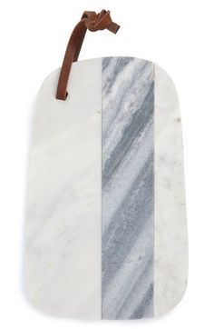 marble cutting board with brown leather handle