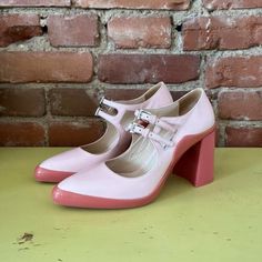 Pink Prada Mary Jane Heels From Fall 2015 Collection In Nearly Perfect Condition. Looks Like They Have Barely Been Worn Outside. Size 38, 4 Inch Heel, Measures 10.5 Inches On The Inside. Pumps By Prada Typically Run A Half Size Small. Baby Pink, Bubblegum Pink, Chunky Heel, And In Amazing Condition. Prada Leather Pumps Pink Rubber Trim Semi-Pointed Toes Block Heels Mary Jane Strap & Buckle Closure At Ankles Summer Pink Calf Leather Heels, Pink Calf Leather Heels For Summer, Designer Heels With Buckle Closure For Spring, Modern Pink Heels With Buckle Closure, Designer Heels For Spring Workwear, Designer Pink Calf Leather Heels, Designer Calf Leather Heels For Spring, Designer Office Heels For Spring, Designer Spring Office Heels