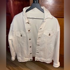 Super Cute!! Oversized White Jean Jacket Practically Brand New, No Imperfections. Great Quality, Thick Denim With Some Stretch To It. Tag Is Xs But Could Fit Up To A Large. It Is Very Much Oversized In Width. Baggy/Looser Fit On Xs-M. I Typically Wear A Small In Tops And Jackets. White Relaxed Fit Outerwear, Beige Long Sleeve Denim Jacket Casual, Relaxed Fit White Outerwear For Day Out, Trendy Cream Cotton Outerwear, Trendy Cream Denim Jacket For Fall, White Collared Outerwear For Day Out, White Cotton Outerwear For Day Out, Oversized White Button-up Outerwear, Casual Cream Button-up Outerwear