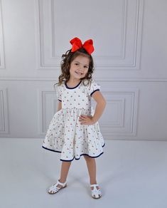 Serendipity Clothing Cherry Pie Charming Dress Style 23-36. Ready to ship! Sizing: Serendipity Clothing fits true to size. If you would like a personal measurement, please contact our shop at 214-517-0882. We offer matching bows & socks under accessories in our menu. Link: https://southernsweetchildren.com/collections/accessories Playful White Dress With Bow, Cute Short Sleeve Dress With Bow, Summer Cotton Dresses With Bow Print, Cotton Summer Dresses With Bow Print, Playful Sleeveless Dress With Bow, Summer Cotton Dress With Bow Print, Cute White Dresses With Bow Print, White Sleeveless Dress With Bow Print, Casual A-line Dress With Bow