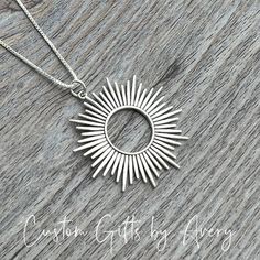 Crafted in solid .925 sterling silver - Celebrate the radiance of the sun when you wear this sterling silver sunburst spikey sun pendant. This full circle of sun rays emanates power and sheer joy. You have the option to purchase this pendant on its own or ready to wear with an Italian made box or rolo chain. A silver polishing cloth is included in your purchase to help you keep your jewelry booking its best.  Dimensions: * 37 mm high (including jump ring) * 32mm wide While I do my best to photog Celestial Sterling Silver Necklace With Sun Design, Minimalist Sterling Silver Jewelry With Sun Design, Sterling Silver Sun Design Spiritual Necklace, Silver Celestial Necklace With Sun Design, Sterling Silver Necklace With Sun Design, Silver Sterling Silver Necklace With Sun Design, Silver Sun Design Pendant Necklace, Sterling Silver Jewelry With Sun Design, Silver Sun Design Necklace For Gift