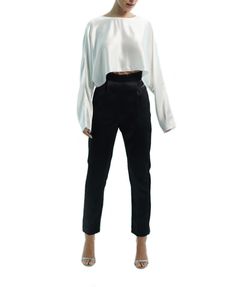 100% poly Dry clean only Raw hem Satin fabric Chic Long Sleeve Satin Top, Long Sleeve Viscose Blouse For Night Out, Silk Long Sleeve Padded Blouse, Sleek Long Sleeve Viscose Tops, Chic Cropped Satin Blouse, Satin Long Sleeve Blouse For Night Out, Silk Cropped Top For Night Out, Elegant Cropped Silk Tops, Formal Cropped Blouse For Fall